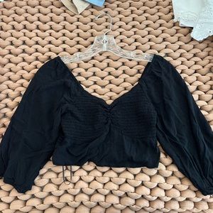 Quarter sleeve black top